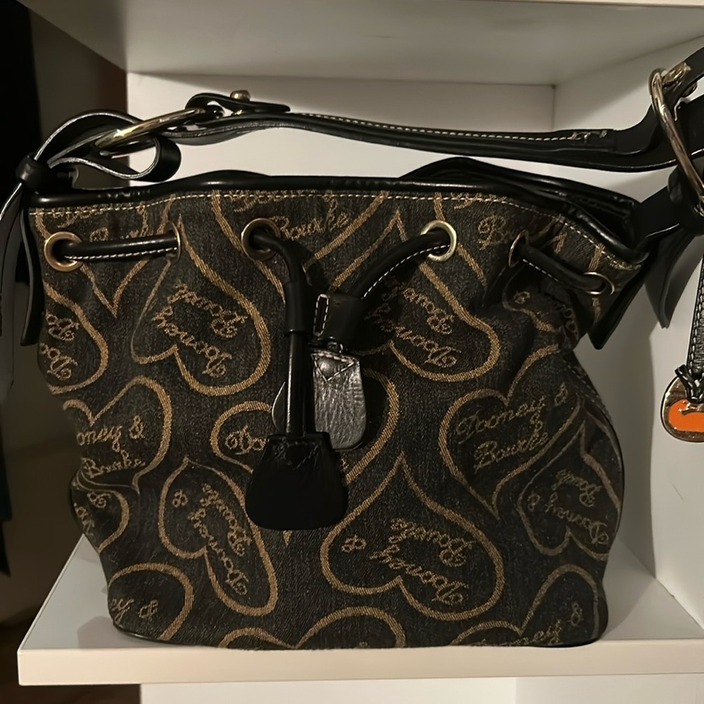 Dooney and Burke black denim and leather heart bucket bag.